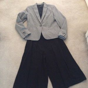 Two Stylish Gap wide leg culotte skirts. One black, one beige.